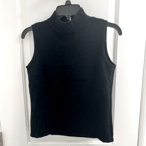Sleeveless acrylic black blouse mockneck with beaded design